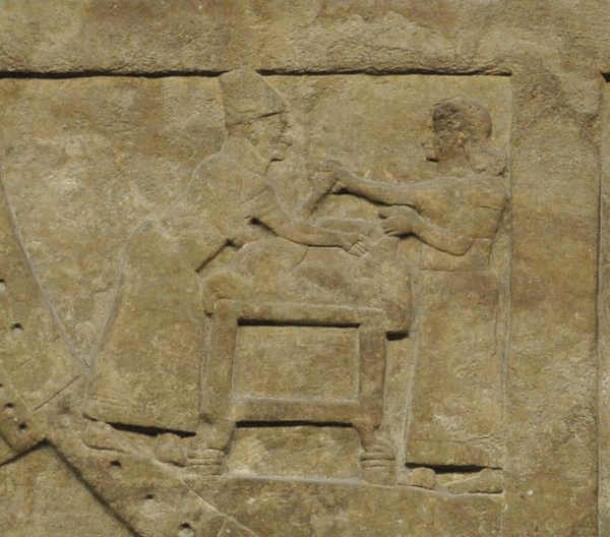 A diviner and his assistant preparing animal for sacrifice in ancient Nimrod. (Gtoffoletto/CC BY-SA 4.0).